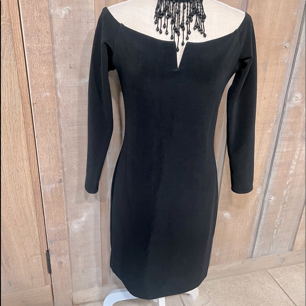 Sexy, stretchy formal dress, short, classy, fun dress to wear. Beaded collar.